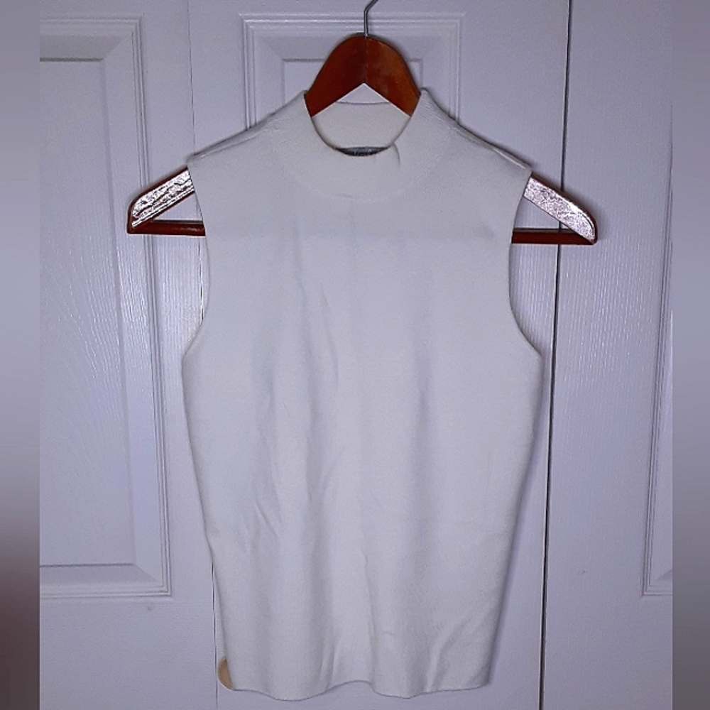 Soft fine knit, pearl white, sleeveless turtlneck womens top size L